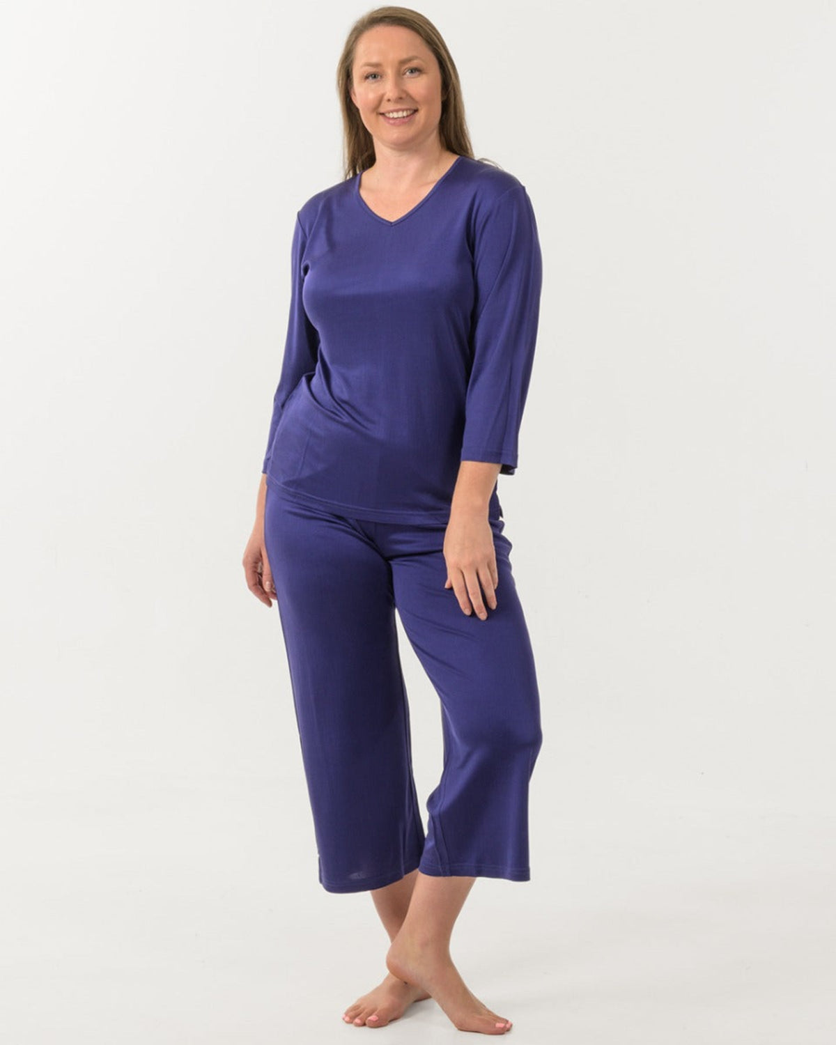 Woman wearing a Silk PJ Set  purple 