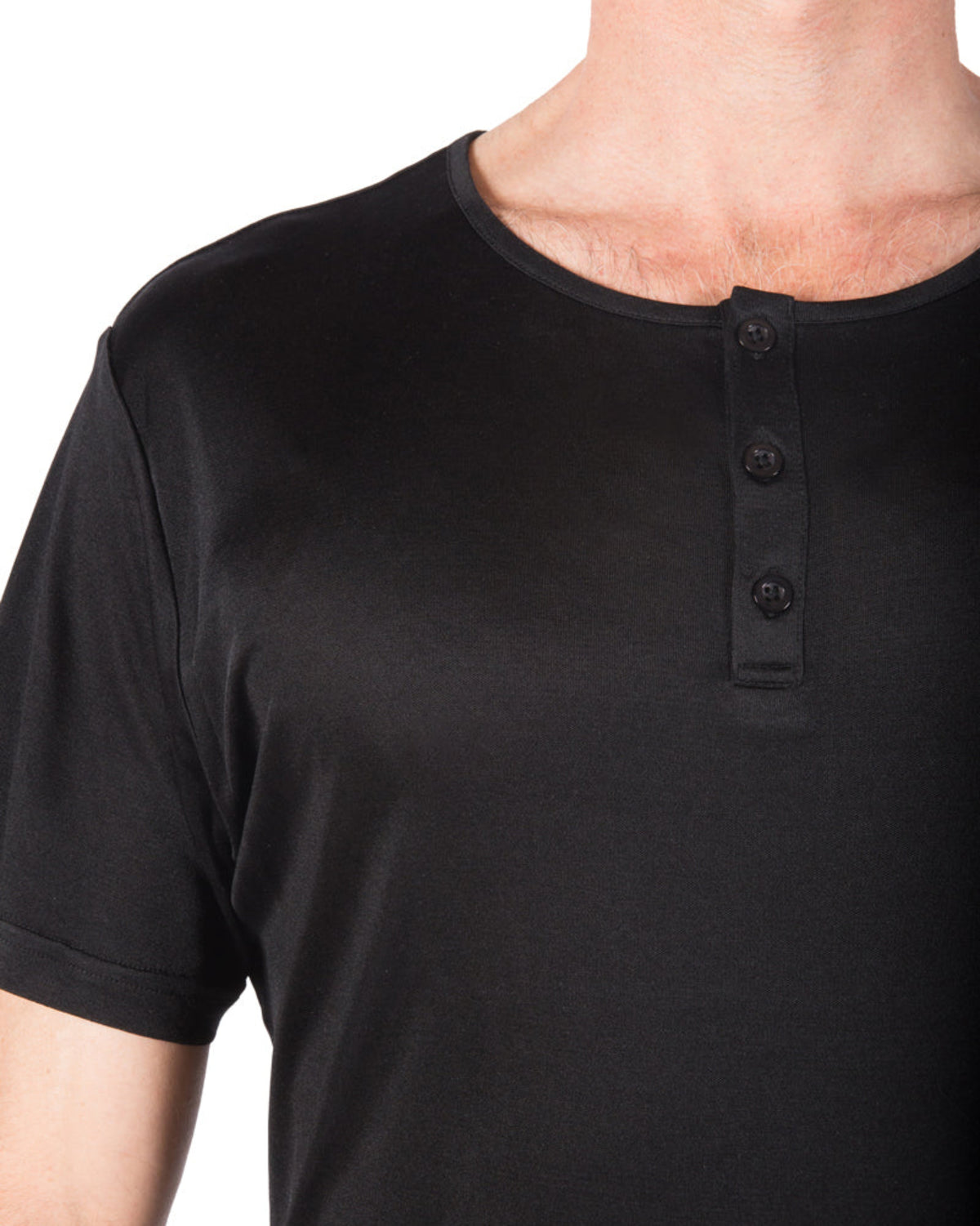 Black henley shirt worn by a person on a white background