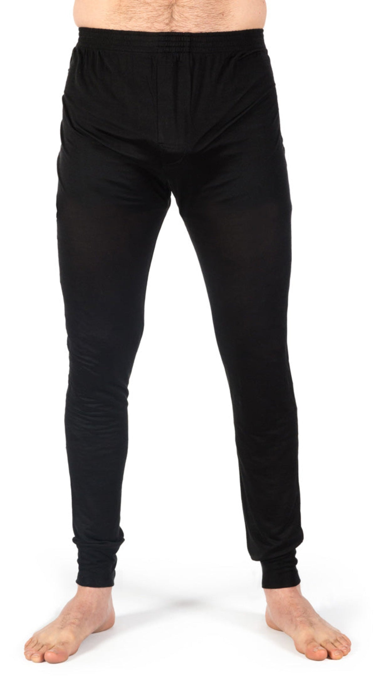 Person wearing silk  black thermal leggings