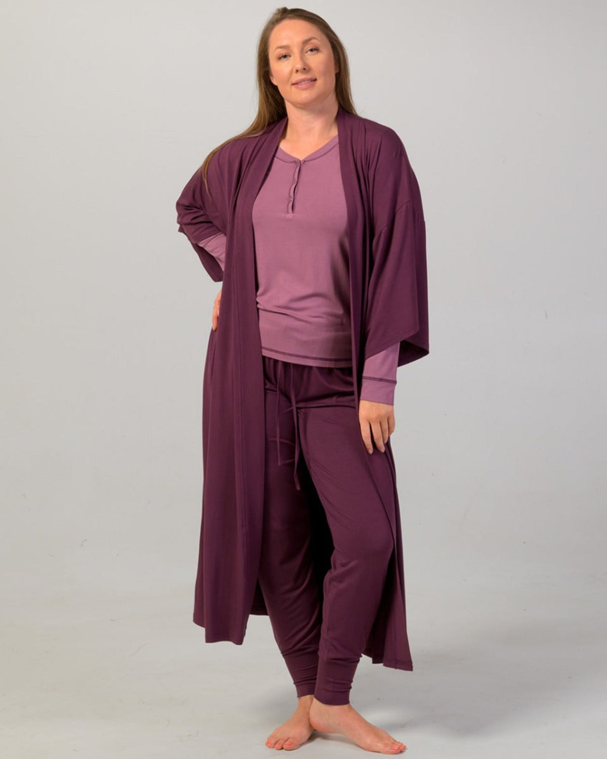 kimono bamboo robe Woman wearing a purple loungewear set with a matching robe on a plain background