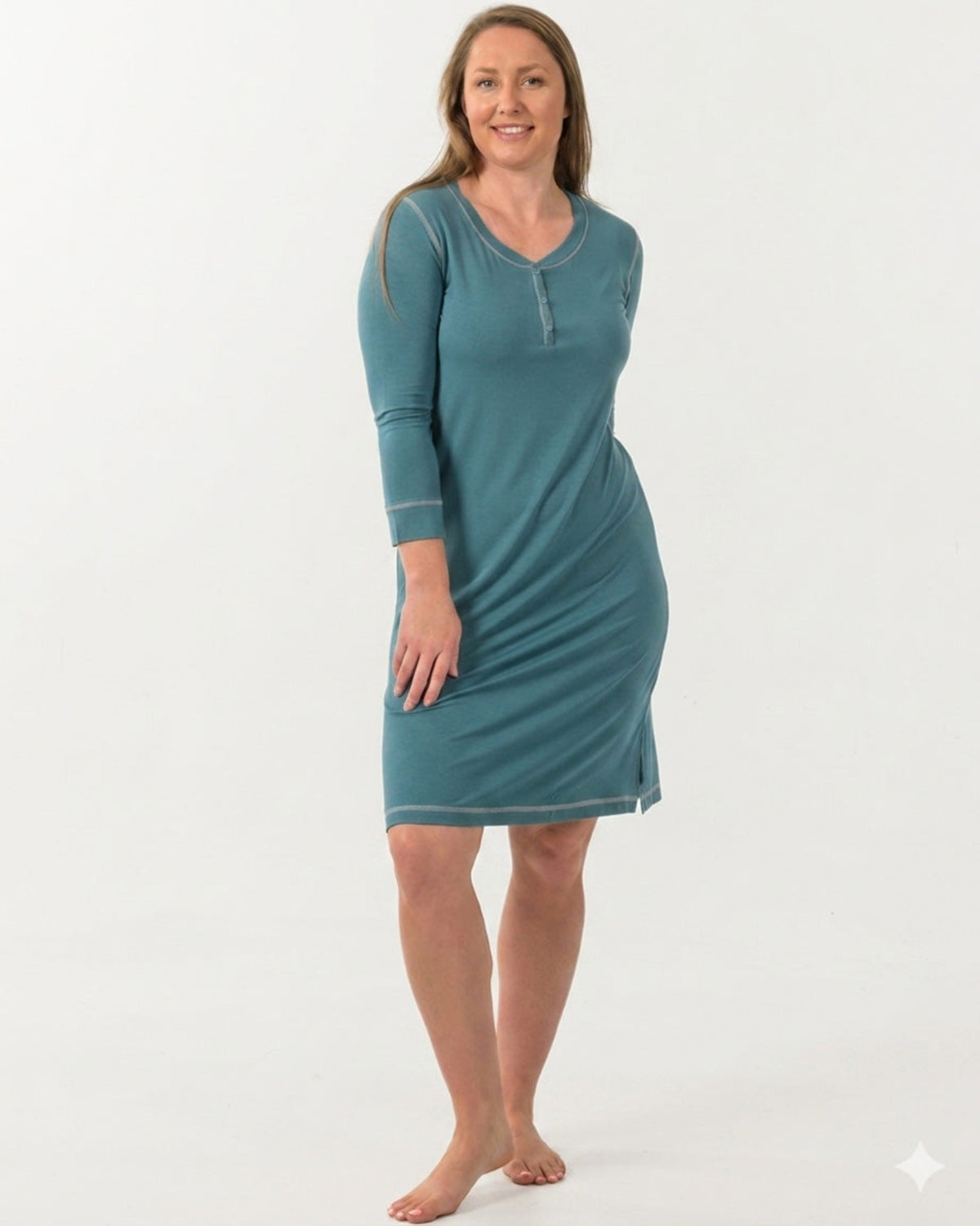 Woman wearing a bamboo  henley nighshrit teal nightshirt 