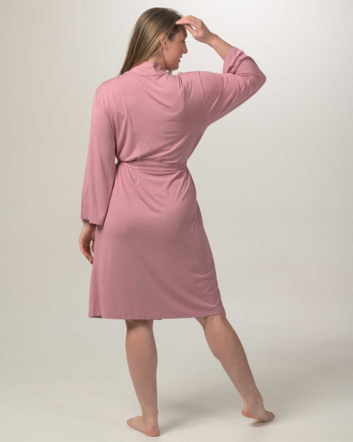 Woman wearing a  bamboo knee length robe 