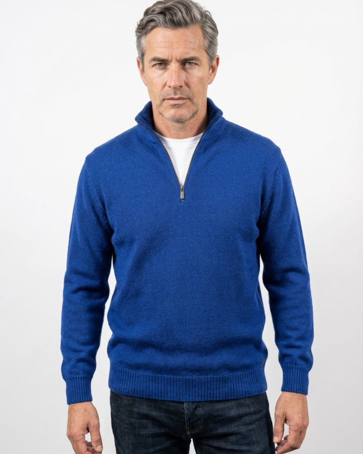 Man wearing a merino blue quarter-zip sweater on a white background