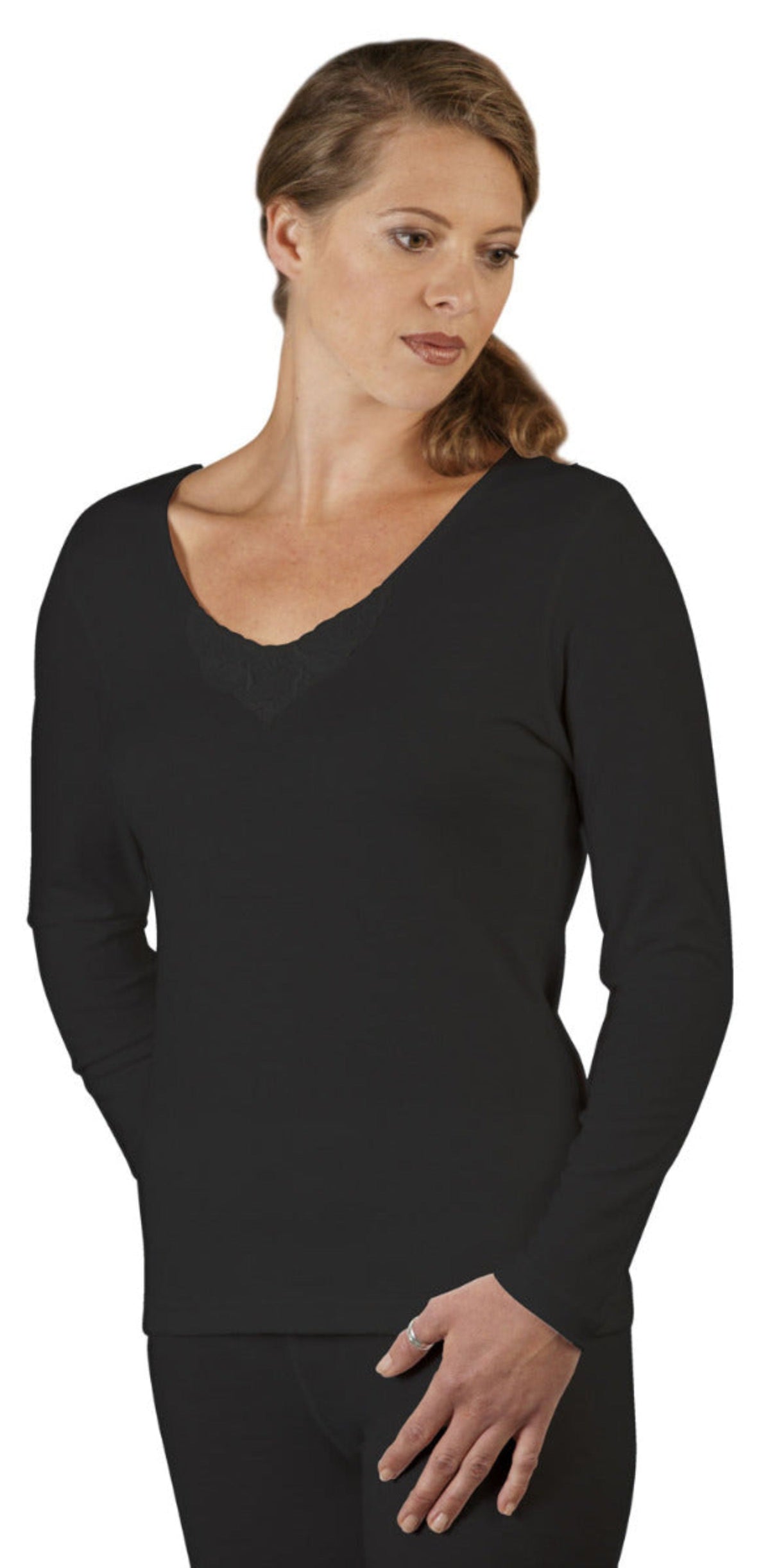 Woman wearing a merino black long-sleeve top on a white background