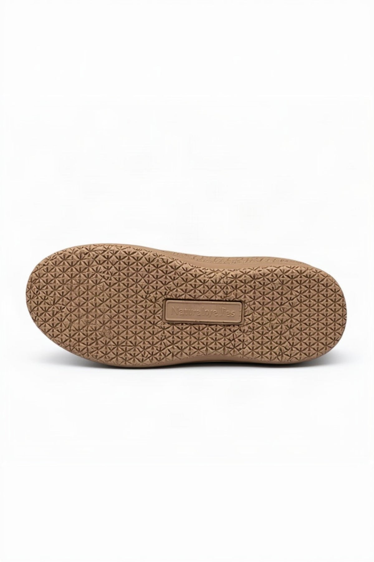 Brown shoe sole with geometric pattern on a white background