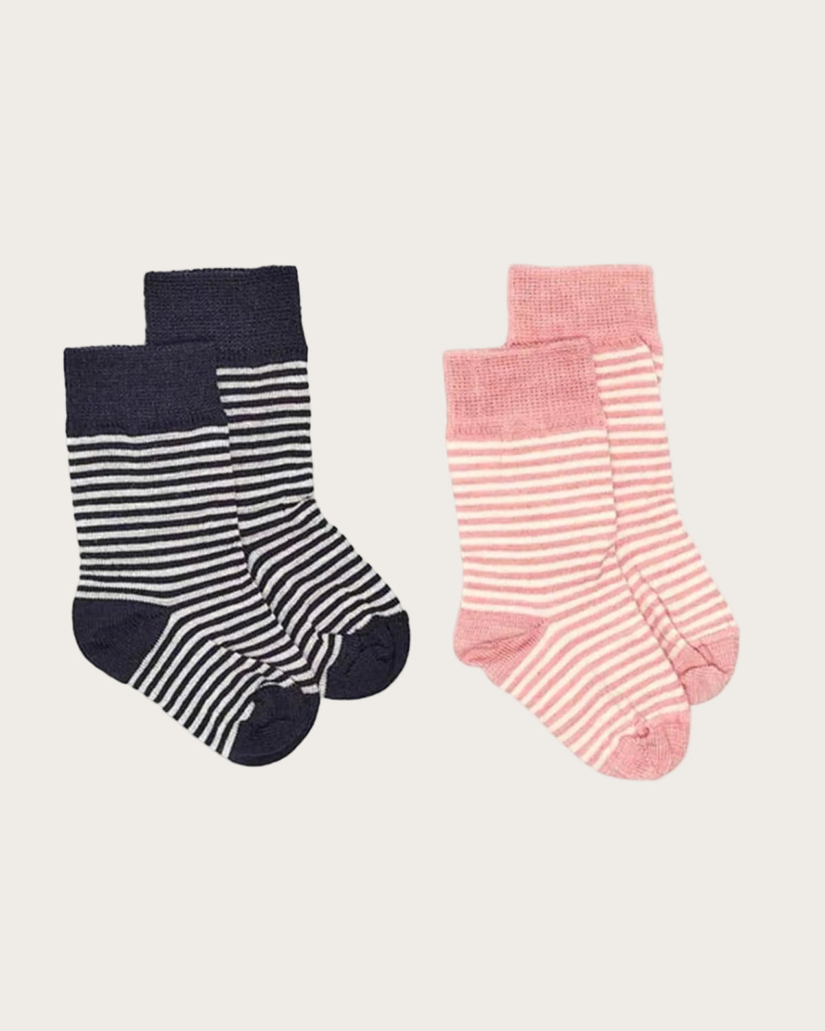 Two pairs of merino striped socks, one navy and white, one pink and white, on a white background.