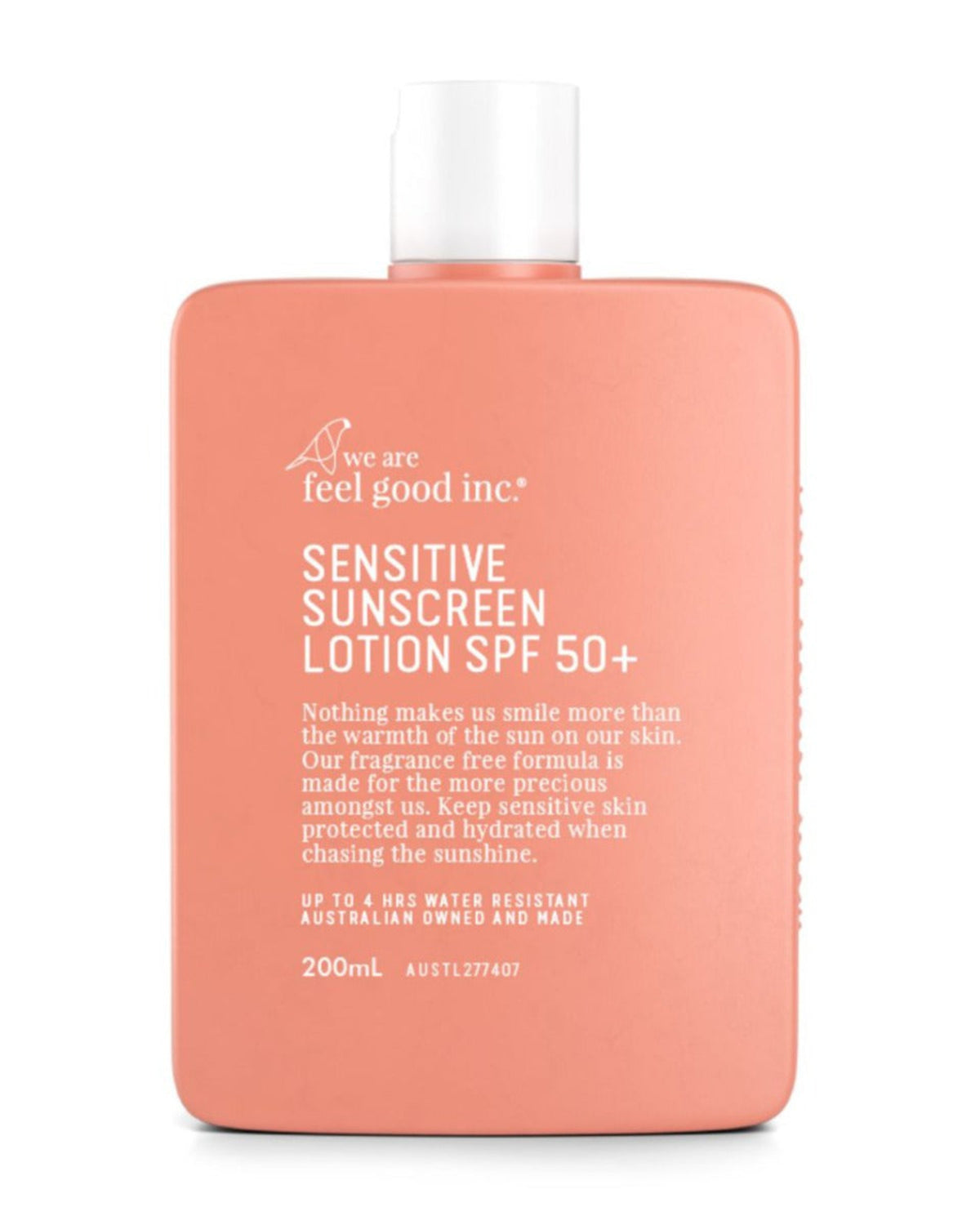 Pink bottle of Sensitive Sunscreen Lotion SPF 50+ by we are feel good inc. on a white background