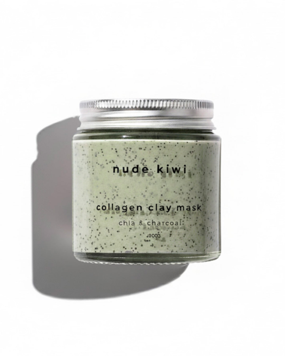A jar of 'nude kiwi' collagen clay mask with a silver lid, containing a speckled light green mask, set against a plain white background with a soft shadow.
