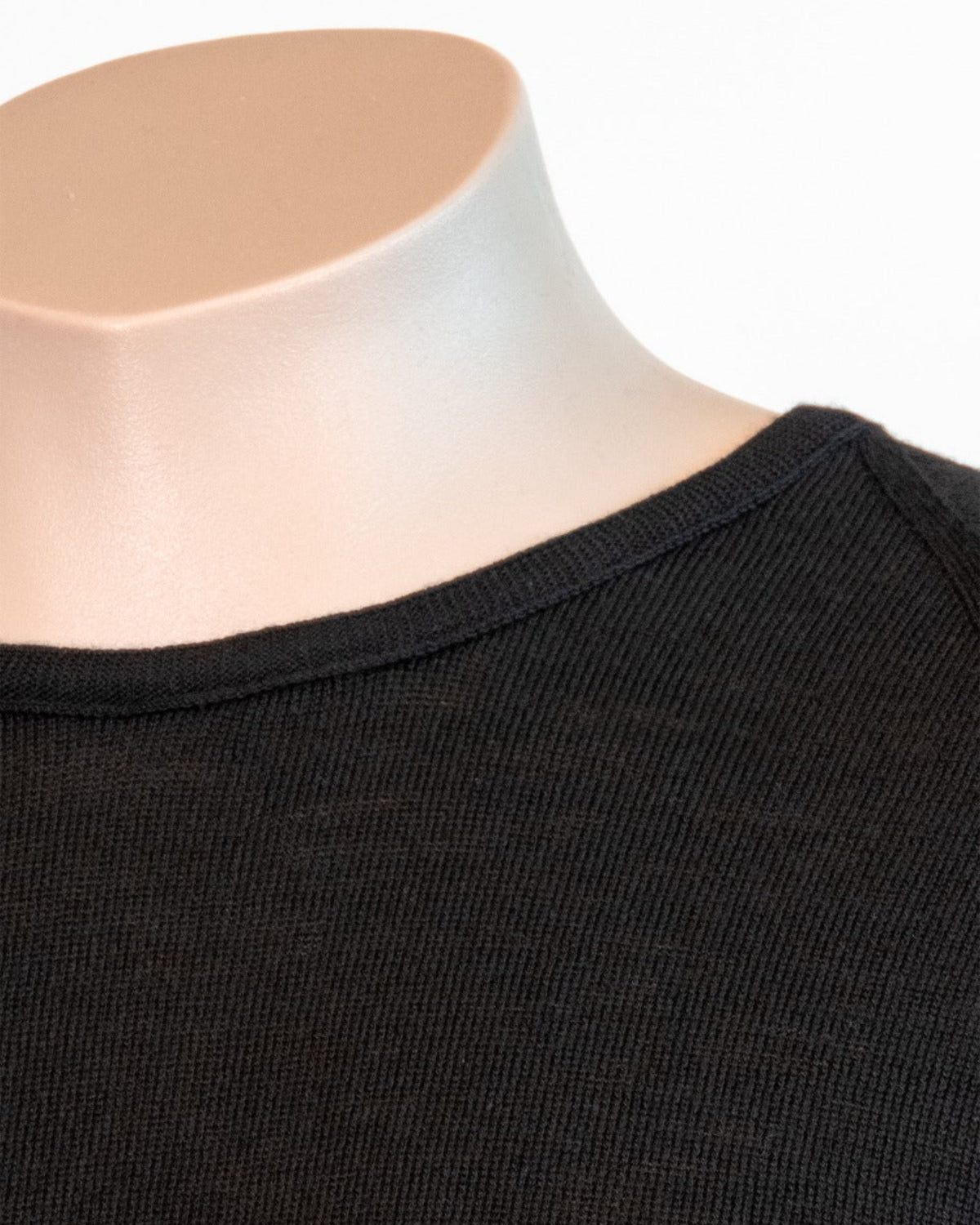 Acrux Superfine Merino Long Sleeve T-Shirt Black ribbed knit garment on a mannequin with a white background