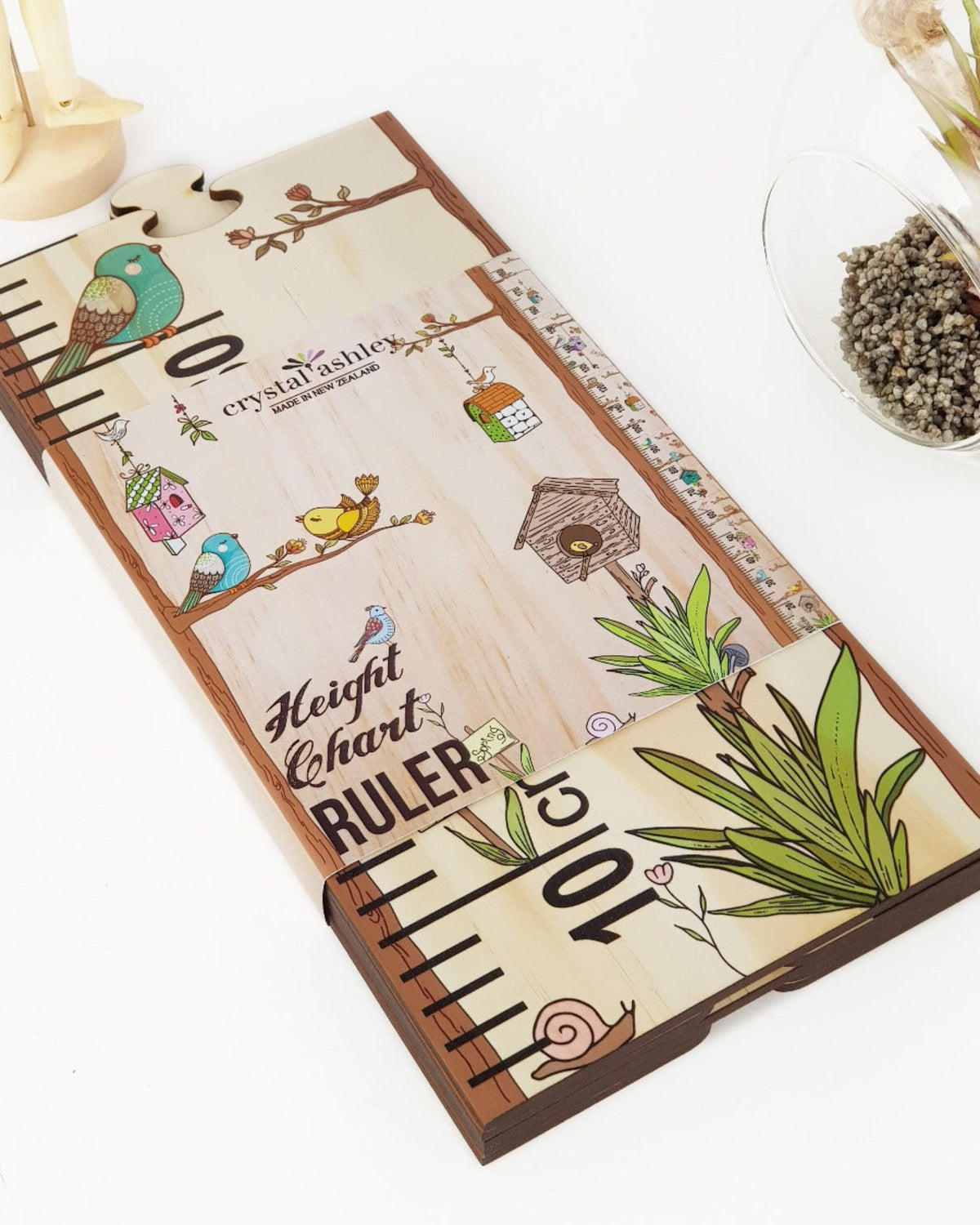 Height chart ruler with decorative elements on a white background