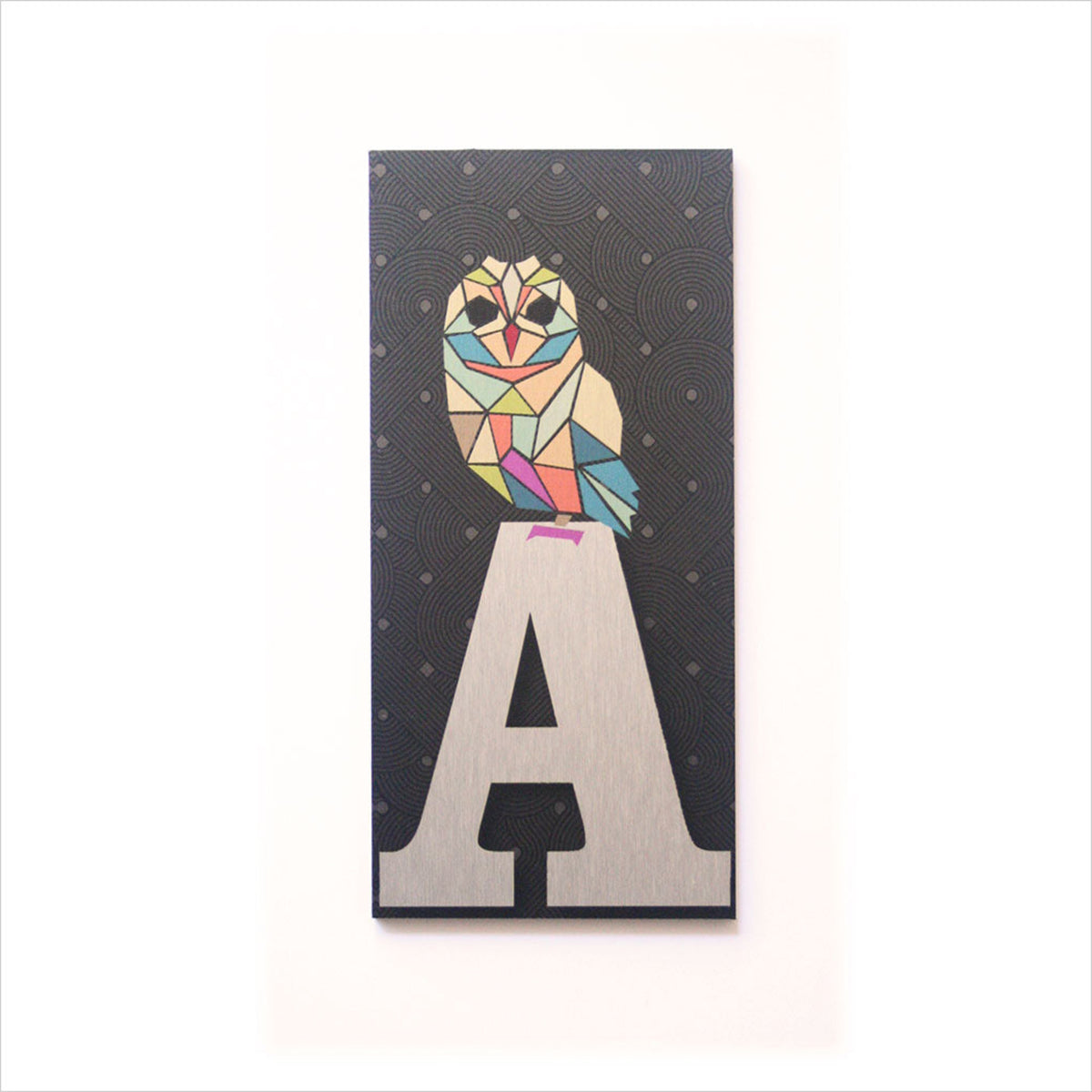 house  and letter box number  Colorful owl design on a letter 'A' against a black background with white polka dots.