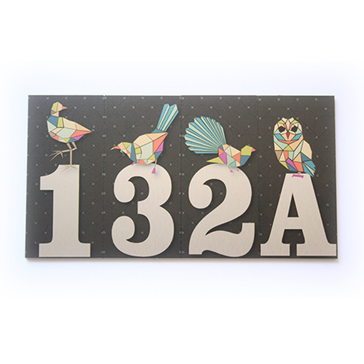 house  and letter box number Decorative house number '132A' with colorful geometric birds on a dark background