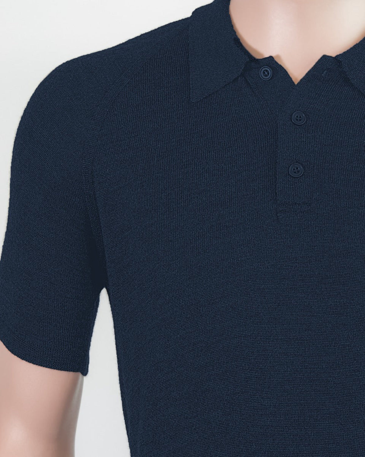 Navy merino blue polo shirt on a mannequin against a white background