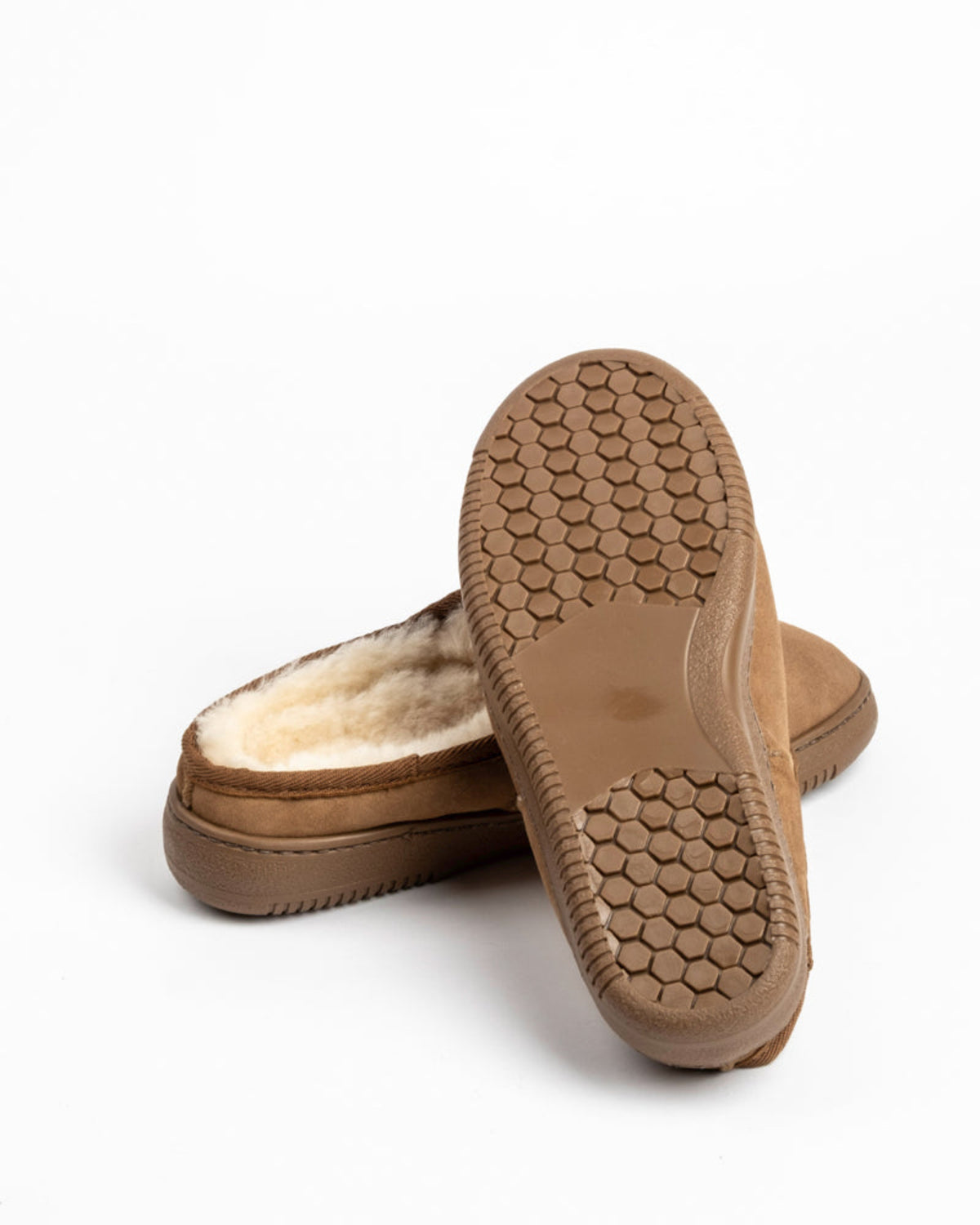 clog sheepskin Brown slippers with sheepskin lining on a white background